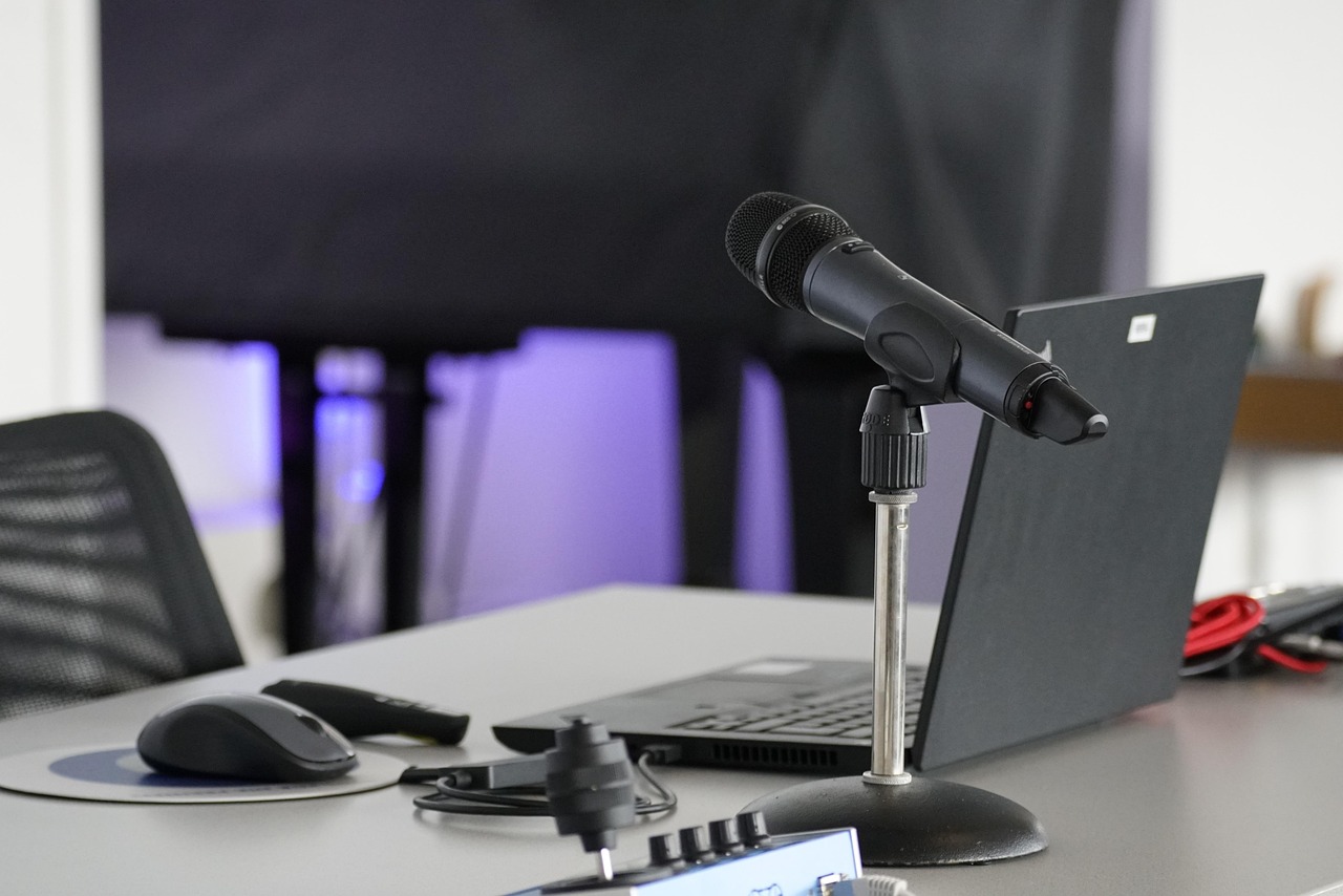 Laptop, conference table, mouse — Unlocking Wellness: The Ultimate CBD Oil Guide for Health and Harmony
